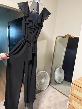 Francesca's Collections Black Ruffle V-Neck Tie-Waist Jumpsuit